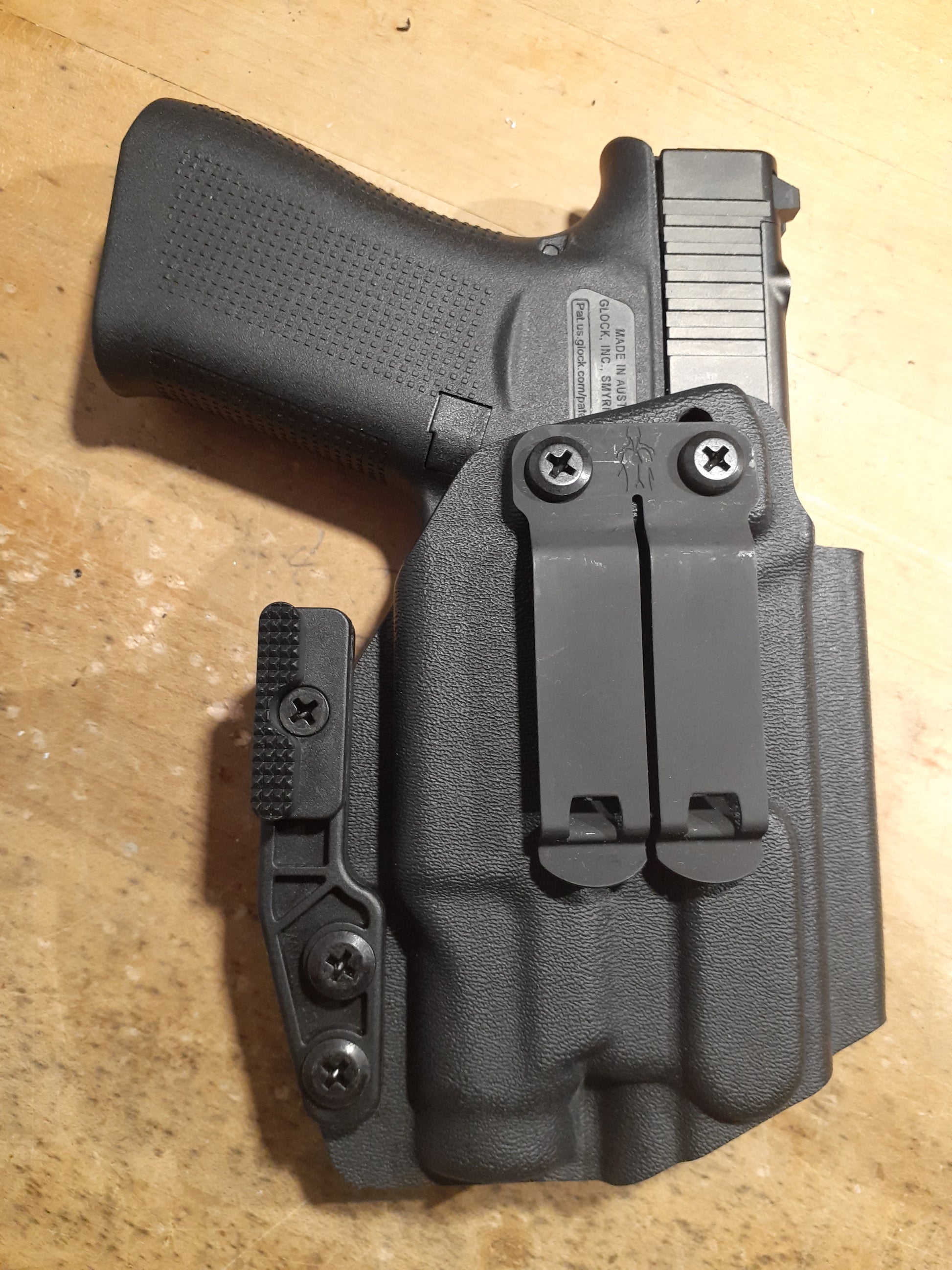 Inside the waistband holster compatible with Glock and tlr7 sub light