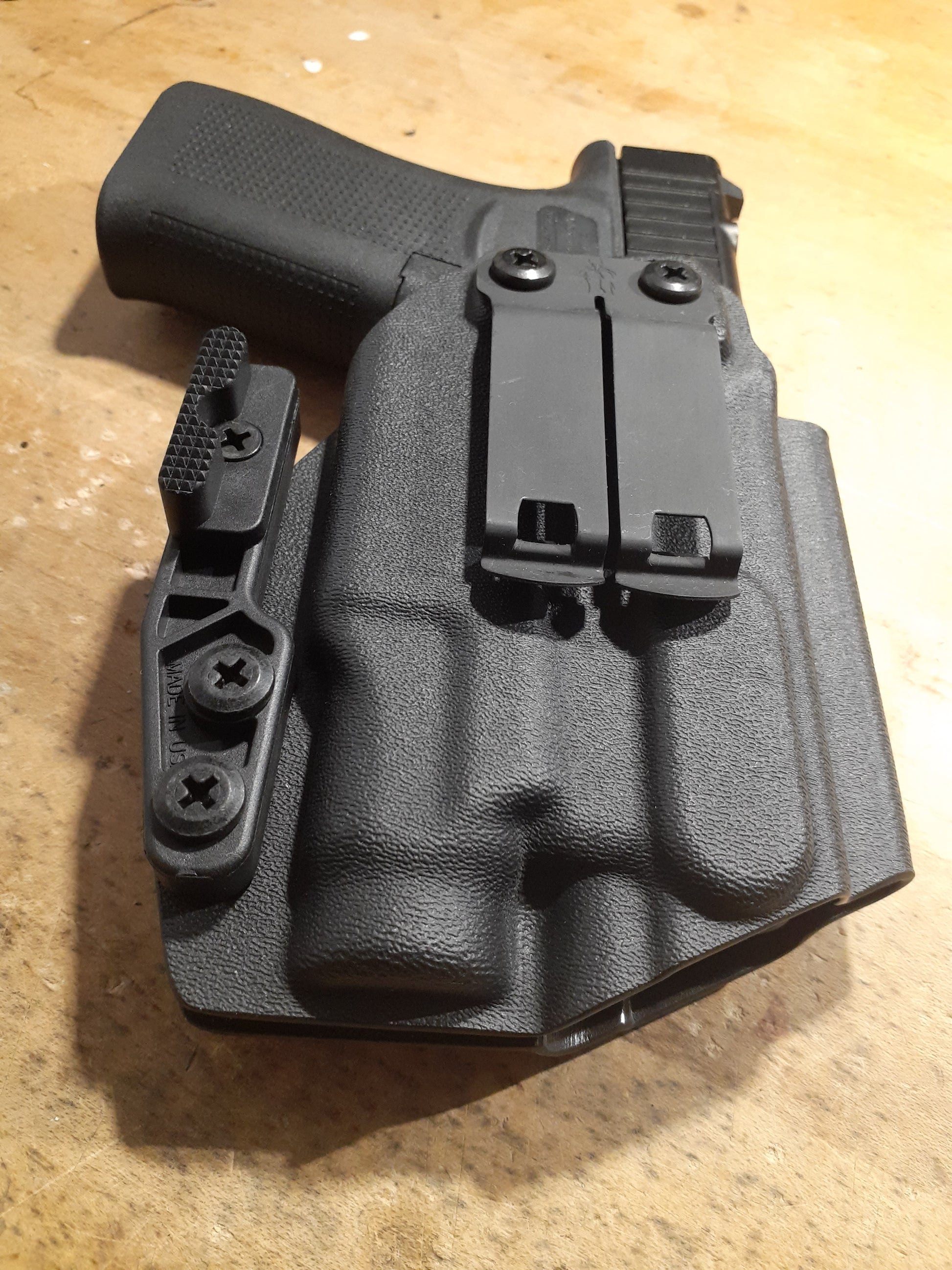 Inside the waistband holster compatible with Glock and tlr7 sub light